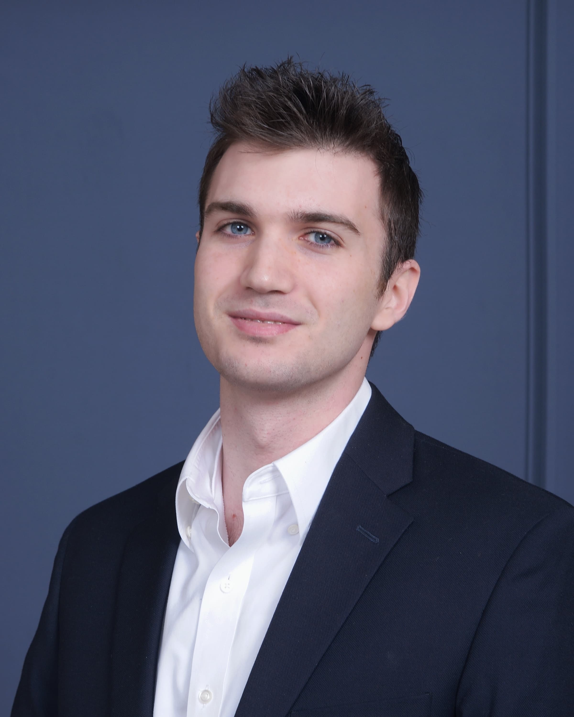 Professional headshot of James Leone